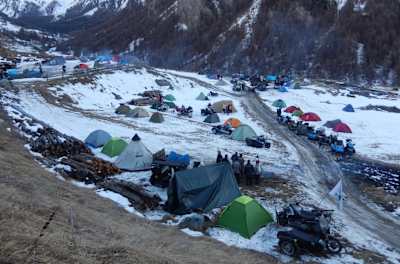 Kristal Rally attendees camp on the mountain side