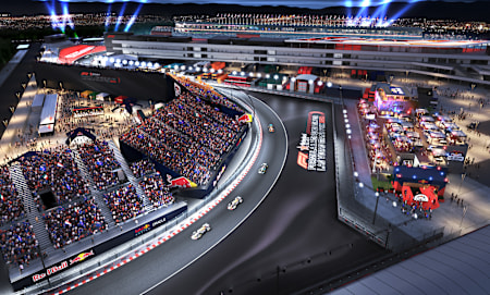 A night-time aerial view of Red Bull Energy Station Las Vegas & Oracle Red Bull Racing Fan Grandstands.