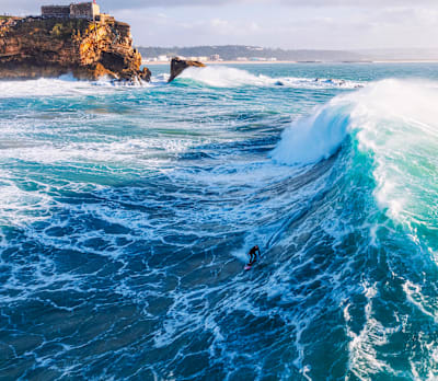 All’s swell: Crane trains in Nazaré with jet‑ski pro Eric Rebiere