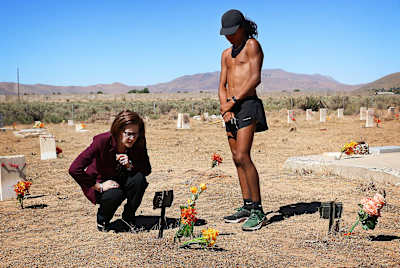 Stevens and U.S. Senator Catherine Cortez Masto pay their respects at a grave site at the Stewart Indian School.