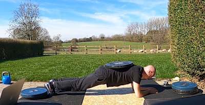 Weighted plank bodyweight exericse