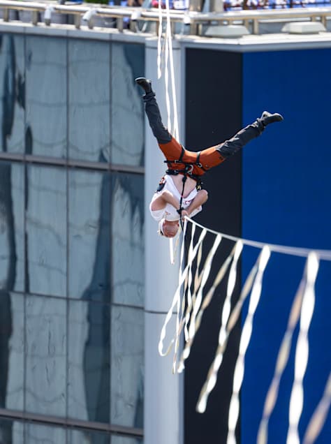 Slackliner Jaan Roose performs a trick on a slackline high above Seoul in Ocrtober 2026.