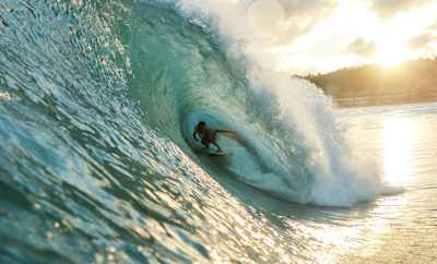 Marlon Gerber surfing in the Indonesian morning light.