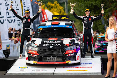 Co-driver Kozdroń and Rzeźnik celebrate post-82nd Rally Poland