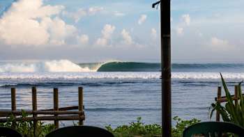 A perfect wave breaks at Desert Point, Indonesia
