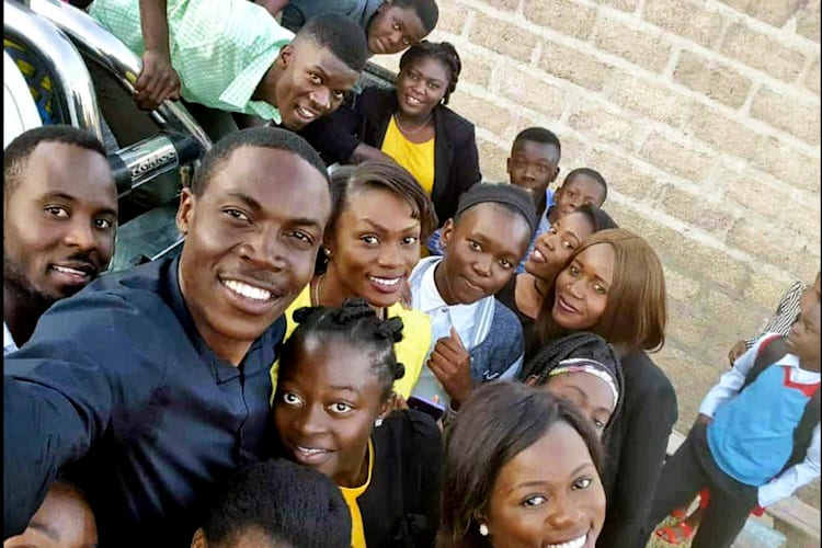 Enock Mwepu with fans at a youth camp in Chingola, Zambia
