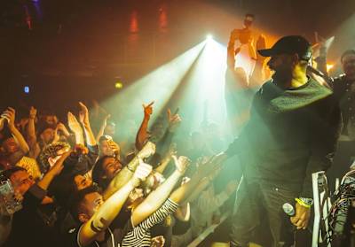 A photo of grime artist Kano live at London club Fabric.