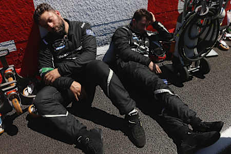 Team staff rest in the heat at the Le Mans 24 Hours endurance race in Le Mans, France on June 17, 2017.