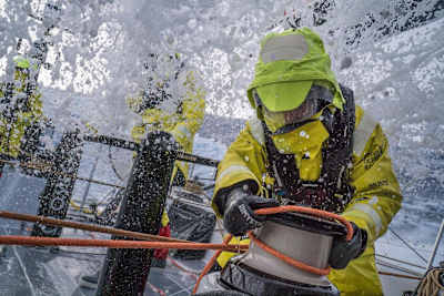 Leg 7 from Auckland to Itajai, day 08 on board Brunel. Nina Curtis takes a reef before a snow squall. 26 March, 2018.