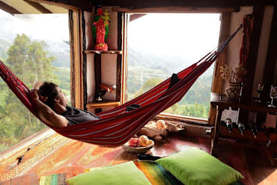 Skateboarder Zack Wallin chills in a hammock in Salento, Colombia