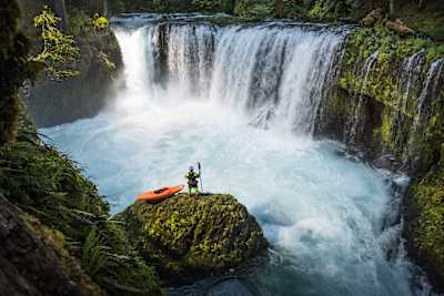 Rafa Ortiz prepares to descend a waterfall in his kayak.