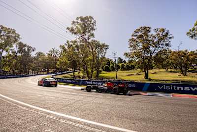 The Oracle Red Bull Racing RB7 is seen racing with Shane Van Gisbergen in the Supercar on Mount Panorama in Bathurst, Australia on February 4, 2023.