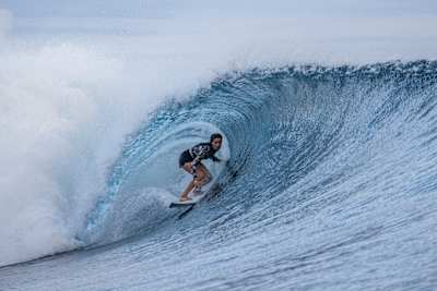Teresa Bonvalot surfing at Teahupoo