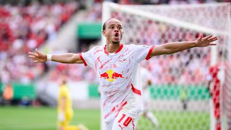Xavi Simons celebrates a goal while playing for RB Leipzig.