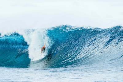 Molly Picklum surfing Teahupo'o in Tahiti