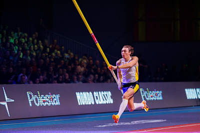 Armand Duplantis sprinting toward the crossbar at Mondo Classic inUppsala, Sweden in 2024 