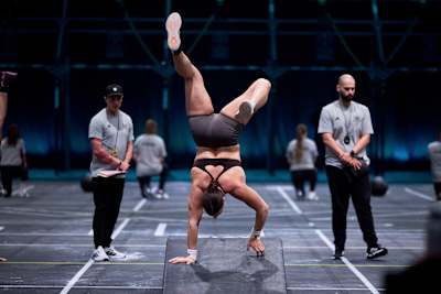 Laura Horváth walks on her hands during the World Fitness Project Finals 2025 in Copenhagen, Denmark.
