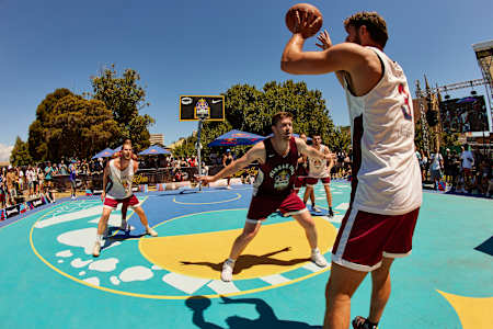 Players hoop on the court in Melbourne's Prahran Park that was renovated for the 2022 Red Bull Half Court tournament.