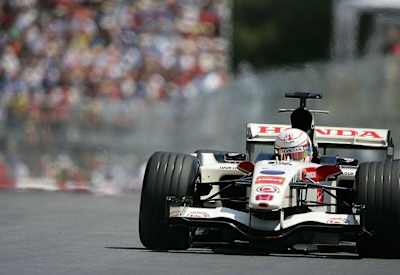 A photo of UK F1 driver Jenson Button driving for BAR (British American Racing) at the 2006 Canadian Grand Prix in Montreal.