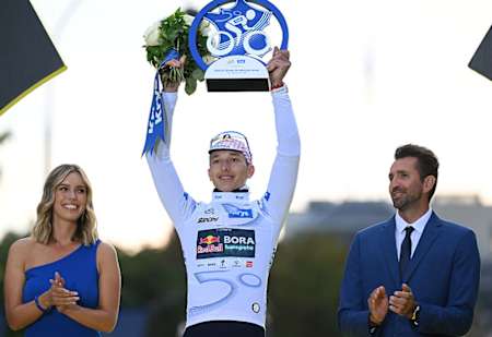 Florian Lipowitz of Germany and Team Red Bull - BORA - hansgrohe celebrates at podium as best young rider in white jersey