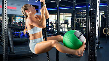 One of Bagby’s favorite parts of her state-of-the-art gym is a CrossFit cage where she does a wide range of calisthenics, including rope climbs with a medicine ball.