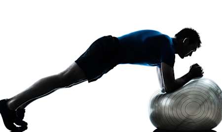 Swiss ball punch out exercise 