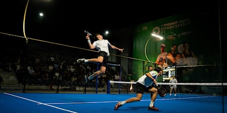 Juan Tello jumps to smash the ball in a match alongside Valentino Libaak in the Riyadh Season Premier Padel P1 at Padel Rush Arena in Riyadh, Saudi Arabia on February 12, 2025.