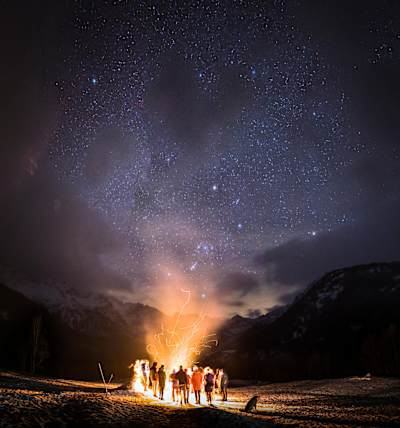 The Nitro snowboard crew enjoys a campfire get-together.
