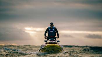 Alemão de Maresias powers across Praia do Norte waters during Jet Ski Rescue Protocols at Red Bull Waves of Consequence 2024 in Nazaré, Portugal, showcasing intensity and adventure