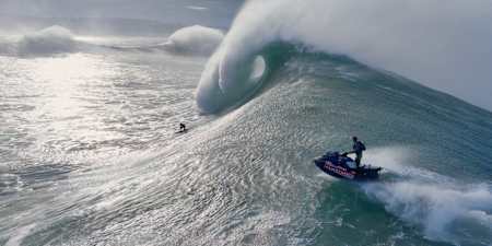 In 2024, Lucas Chianca surfs a massive wave in Nazaré, Portugal