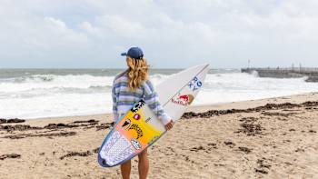 Caroline Marks checks the surf while filming for No Contest: Off Tour Season 3 in Florida, United States on November 5, 2024