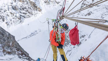 Lukas Irmler gets ready to slackline across two icefalls.