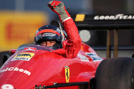 Former F1 driver Gerhard Berger drives a parade lap at the Austrian Grand Prix at the Red Bull Ring.