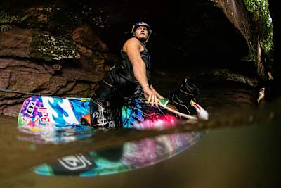 Mike Dowdy prepares to wakeboard in a natural cave found along the shores of Lake Superior in northern Wisconsin, USA on July 10, 2017.