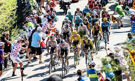 The crowds cheering on the peloton