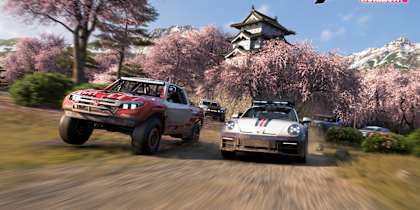 A screenshot from Forza Horizon 6 shows a race under cherry blossoms with a temple in the background. 