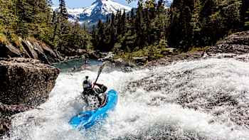 Aniol Serrasolses and Nouria Newman kayak on the Rio Blanco, Patagonia.