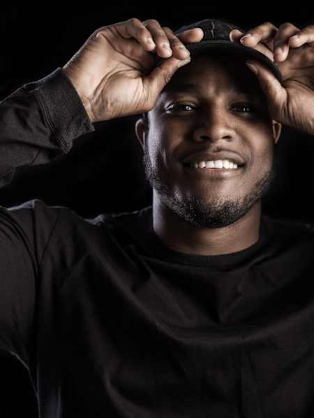 A photo of UK producer DJ Q.