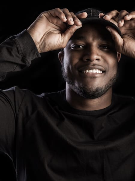 A photo of UK producer DJ Q.