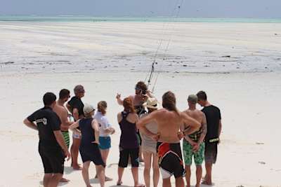 Luke Denny teaching kitesurfing to students in Zanzibar.