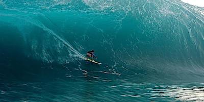 Matahi Drollet inside giant barrel at Teahupoo