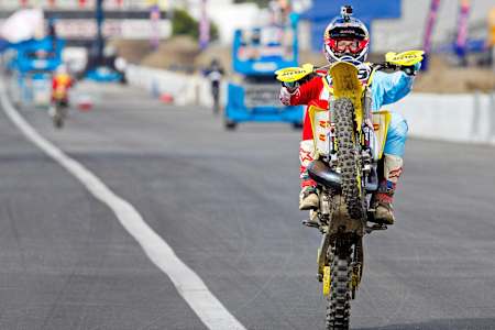 Travis Pastrana wheelies at Straight Rhythm