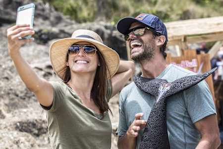 Orlando Duque of Colombia poses for a selfie with his wife, Catalina, during the second stop of the Red Bull Cliff Diving World Series at Sao Miguel, Azores, Portugal, on July 9, 2017.