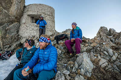 David Wallmann, Bernhard Hug, Mark and Janelle Smiley having a break on the Col della Finestre during Red Bull Der Lange Weg near Entraque, Italy on April 21, 2018.