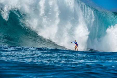 Emily Erickson surfs on her home turn in Waimea Bay on Oahu.