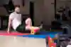 Štefan Svitko foam rolling in his garage