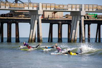 Participants surf at Red Bull Foam Wreckers 2022 in Jacksonville Beach, FL