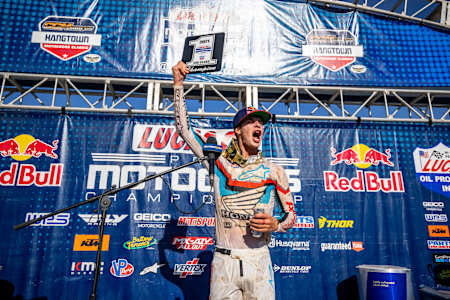 Jett Lawrence celebrates at the 250cc Motocross Championship.