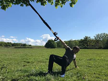 How to single arm squat row using a TRX