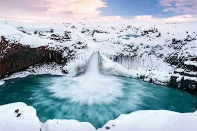 The Aldeyjarfoss waterfall in the icy middle of nowhere in Iceland.